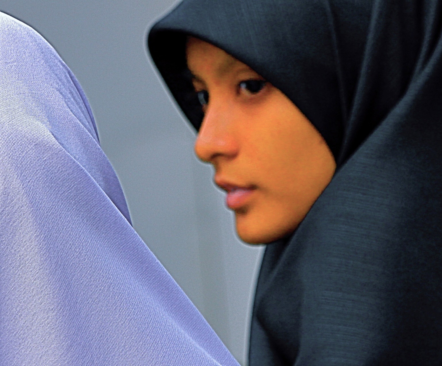 Waiting at a crossing. Bugis Junction, Singapore 2010