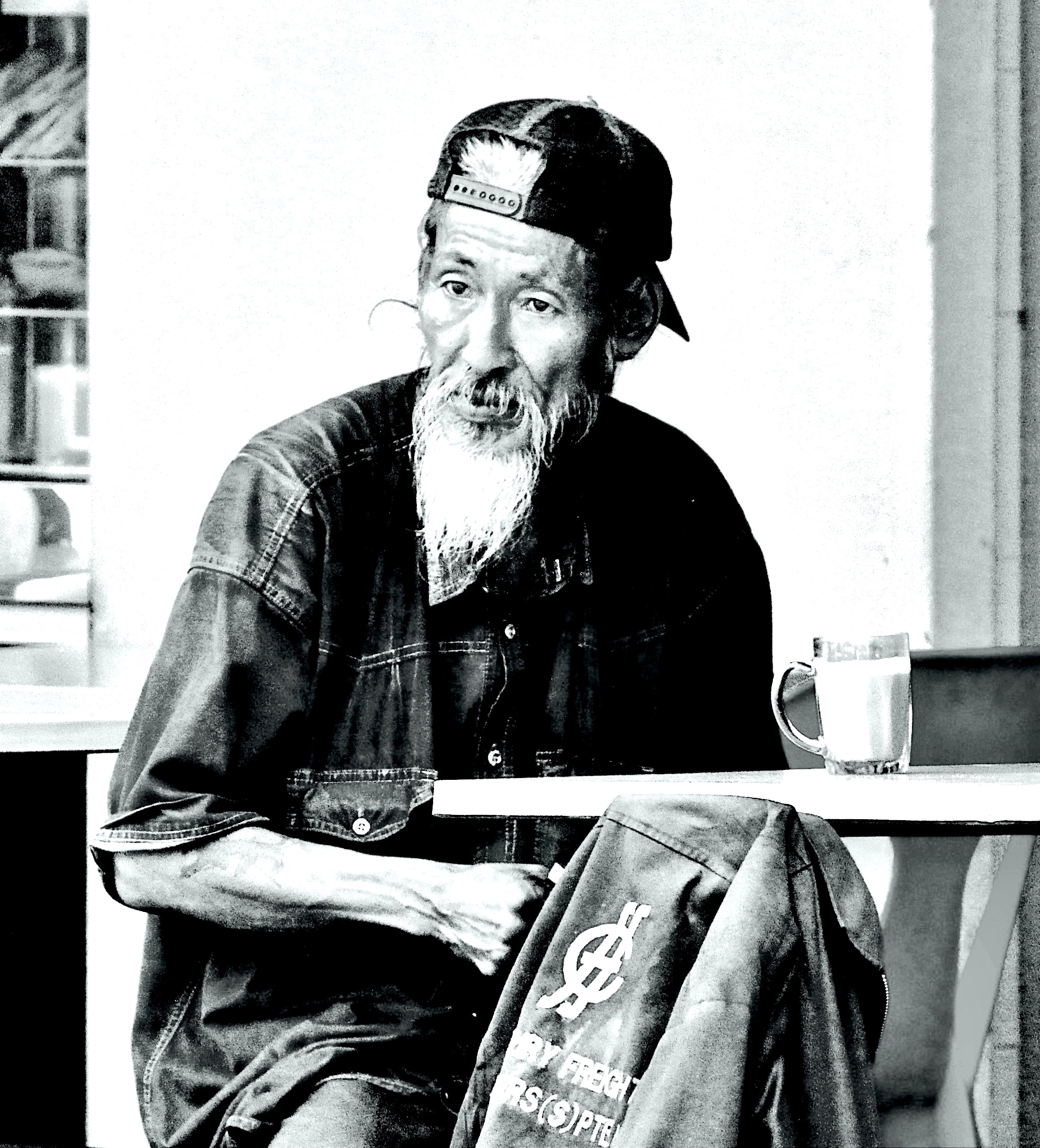 Restaurant patio in Little India, Singapore. The set “Blue Man” came into being. 2009.